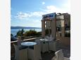 Courtyard - Rooms 11340 Courtyard Nemira (Omiš) - Accommodation 11340 - Rooms near sea with pebble beach.