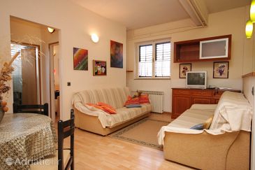 Obývací pokoj Premantura, Obývací pokoj u smještaju tipa apartment, dostupna klima, dopusteni kucni ljubimci i WIFI.