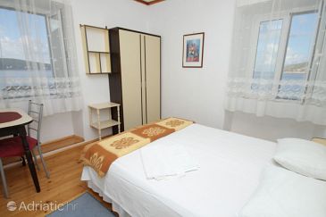 Bedroom Komiža, Bedroom u smještaju tipa room, dostupna klima, dopusteni kucni ljubimci i WIFI.
