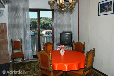 Dining room Povlja, Dining room u smještaju tipa apartment, dostupna klima i WIFI.