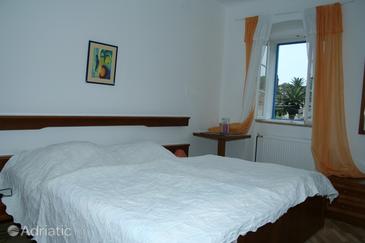Bedroom Veli Lošinj, Bedroom u smještaju tipa room.