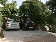 Parking lot - Apartments 4653 Parking lot Stanići (Omiš) - Accommodation 4653 - Apartments near sea with pebble beach.