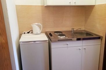 Kitchen Jelsa, Kitchen u smještaju tipa studio-apartment, dopusteni kucni ljubimci i WIFI.