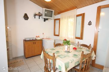 Dining room Nečujam, Dining room u smještaju tipa apartment, dostupna klima, dopusteni kucni ljubimci i WIFI.