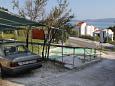 Parking lot - Apartments 5281 Parking lot Medići (Omiš) - Accommodation 5281 - Apartments with pebble beach.