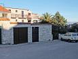 Parking lot - Apartments 6026 Parking lot Supetar (Brač) - Accommodation 6026 - Apartments with pebble beach.