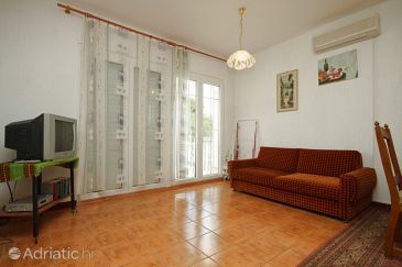 Obývací pokoj Premantura, Obývací pokoj u smještaju tipa apartment, dostupna klima i WIFI.