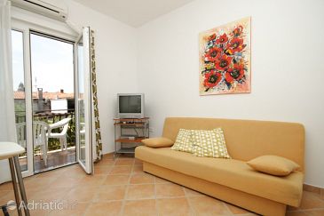 Living room Umag, Living room u smještaju tipa apartment, dostupna klima, dopusteni kucni ljubimci i WIFI.