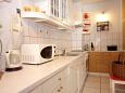 Kitchen 1 Kitchen 1 - Apartment A-8680-a - Apartments Duće (Omiš) - 8680